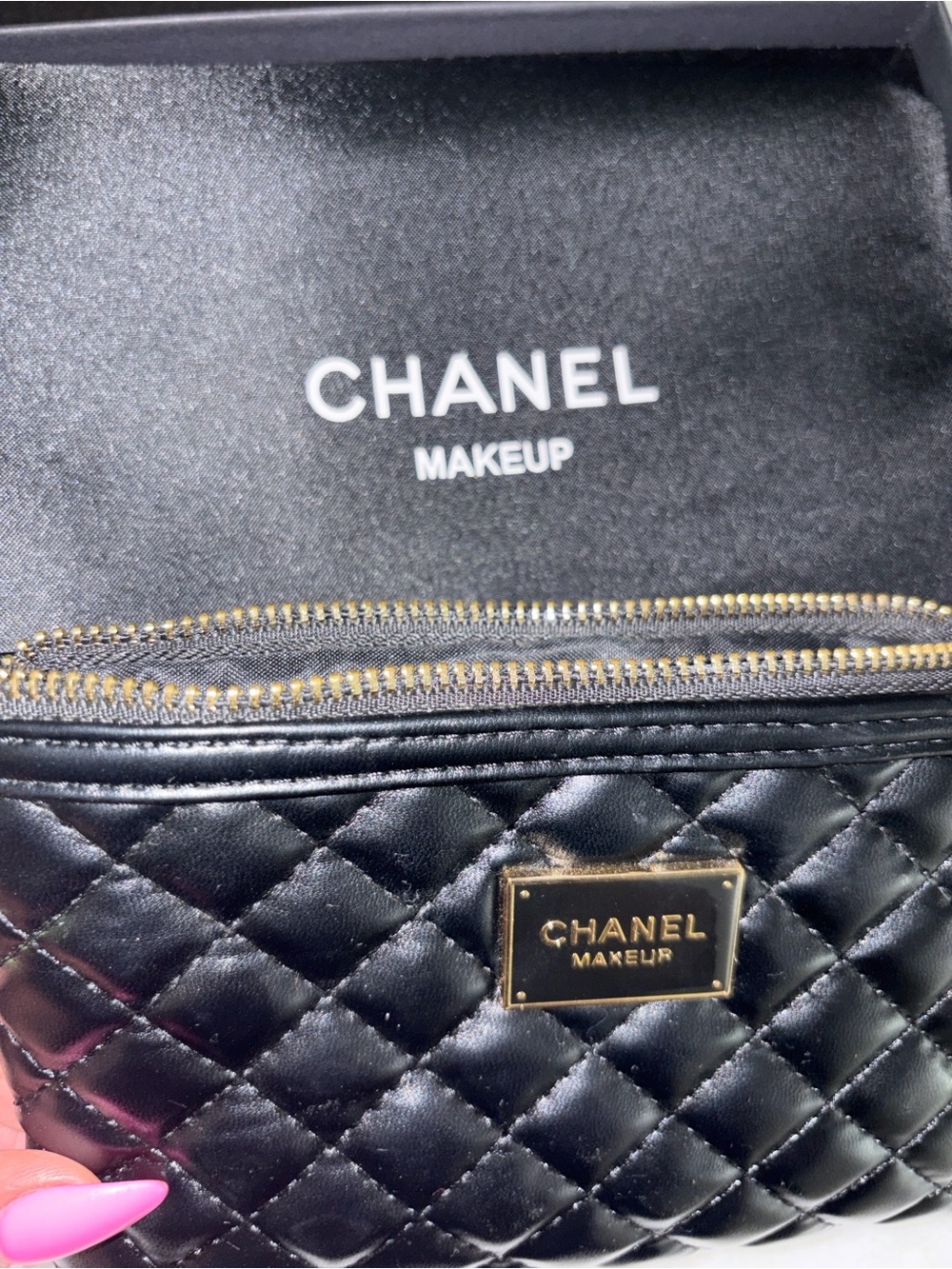 Authentic CHANEL Black Quilted Makeup Pouch with Gold CC Charm